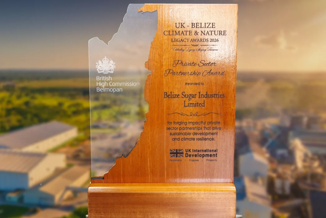 Wooden and Glass UK-Belize Climate & Nature Legacy Awards 2026 that reads Private Sector Partnership Award, Awarded to Belize Sugar Industries Limited for forging impactful private sector partnerships that give sustainable development and climate resilience.