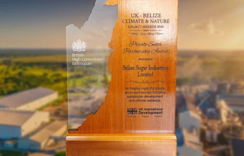 Wooden and Glass UK-Belize Climate & Nature Legacy Awards 2026 that reads Private Sector Partnership Award, Awarded to Belize Sugar Industries Limited for forging impactful private sector partnerships that give sustainable development and climate resilience.